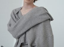 Jenna Rankin is a Masters Fashion Design graduate from The Glasgow School of Art. Her menswear collection draws inspiration from the relationship between clothing and wearer. She is particularly interested in the language of everyday dress, and the way in which we often wear clothing purely for practicality and function (for example; borrowing your Dad’s two-sizes-too-big coat to avoid the rain). Her research stems from explorations of the “uniform of the everyday” with a focus on exploring and subverting traditional ideas of function, scale and silhouette of these basic garments. Inspired by the characters she encountered on the street, and the archive of vintage and well-worn clothing she collected and photographed, the collection gives a nod to utilitarianism while simultaneously, and conflictingly, embracing notions of the excess and the impractical.