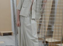 Jenna Rankin is a Masters Fashion Design graduate from The Glasgow School of Art. Her menswear collection draws inspiration from the relationship between clothing and wearer. She is particularly interested in the language of everyday dress, and the way in which we often wear clothing purely for practicality and function (for example; borrowing your Dad’s two-sizes-too-big coat to avoid the rain). Her research stems from explorations of the “uniform of the everyday” with a focus on exploring and subverting traditional ideas of function, scale and silhouette of these basic garments. Inspired by the characters she encountered on the street, and the archive of vintage and well-worn clothing she collected and photographed, the collection gives a nod to utilitarianism while simultaneously, and conflictingly, embracing notions of the excess and the impractical.