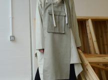 Jenna Rankin is a Masters Fashion Design graduate from The Glasgow School of Art. Her menswear collection draws inspiration from the relationship between clothing and wearer. She is particularly interested in the language of everyday dress, and the way in which we often wear clothing purely for practicality and function (for example; borrowing your Dad’s two-sizes-too-big coat to avoid the rain). Her research stems from explorations of the “uniform of the everyday” with a focus on exploring and subverting traditional ideas of function, scale and silhouette of these basic garments. Inspired by the characters she encountered on the street, and the archive of vintage and well-worn clothing she collected and photographed, the collection gives a nod to utilitarianism while simultaneously, and conflictingly, embracing notions of the excess and the impractical.